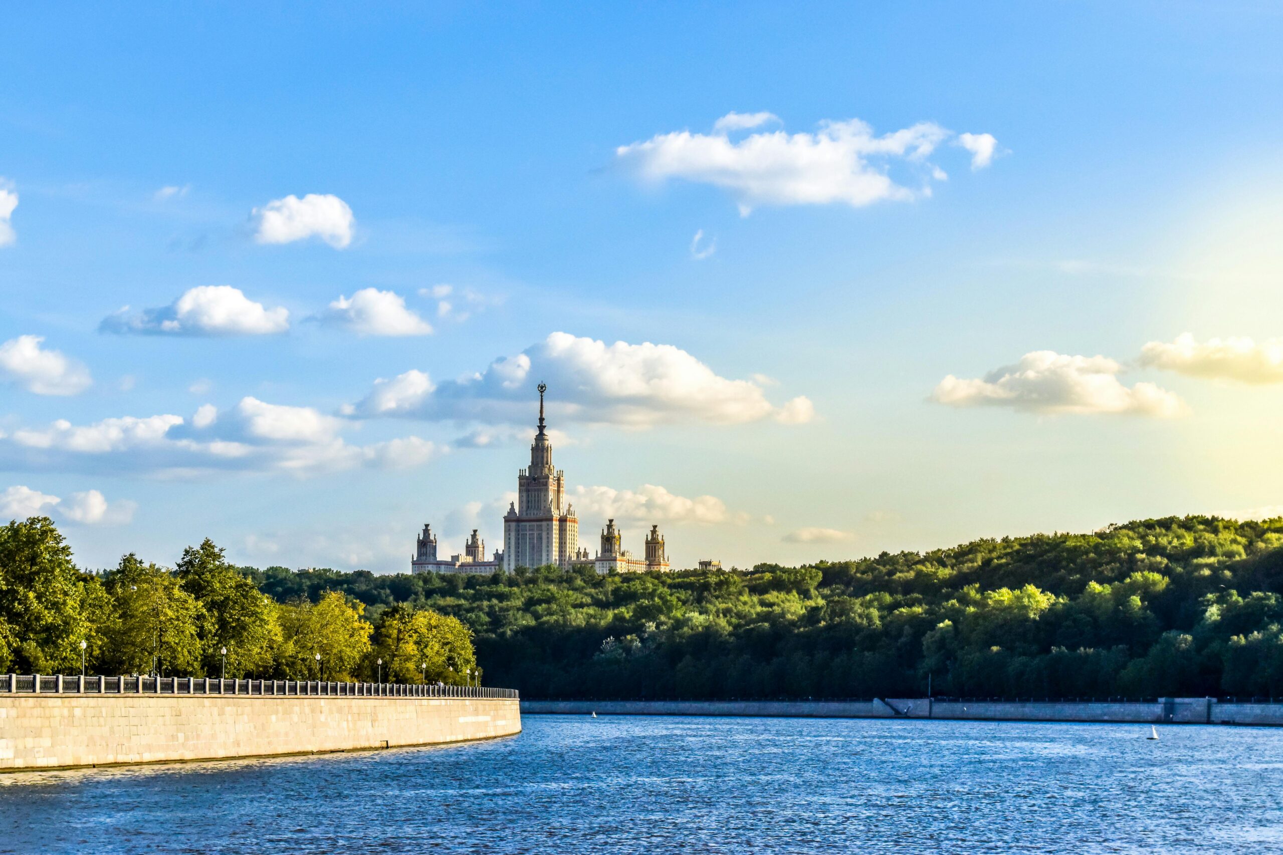 View of Moscow State University and the Moscow River under a clear summer sky.